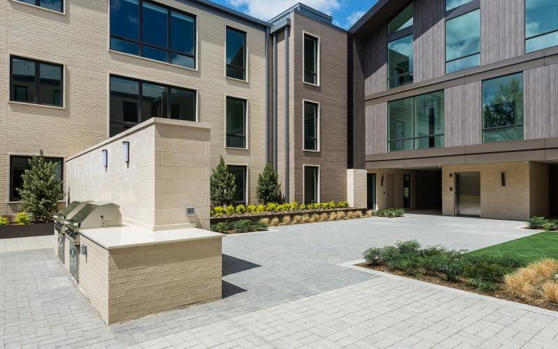 a building with a stone walkway